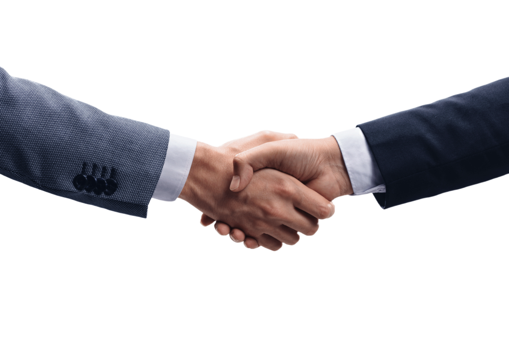 Two people shaking hands, each wearing a suit jacket, symbolizing a partnership.